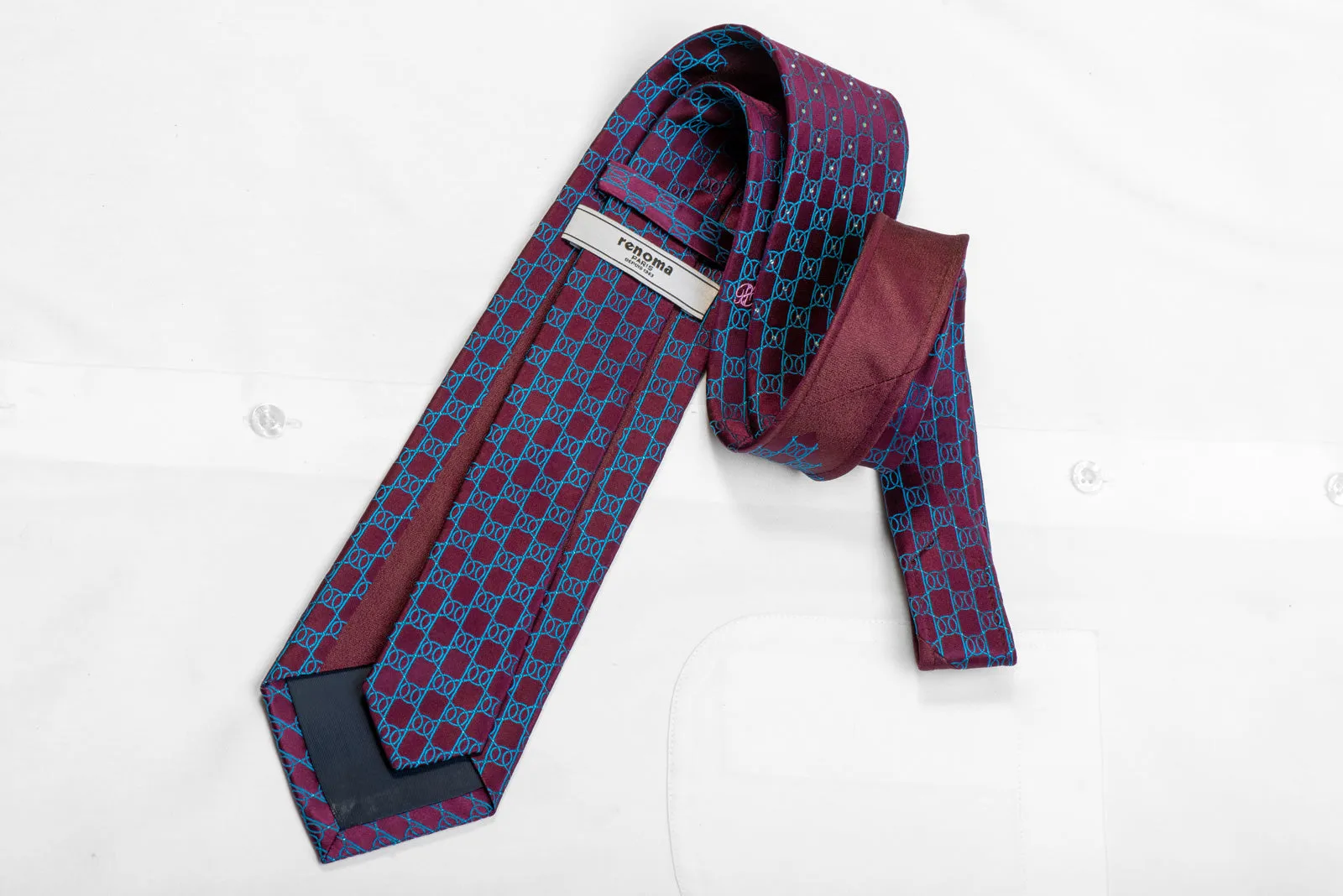 Blue Interlocking Trellis On Burgundy Rhinestone Necktie With Blue Sparkles