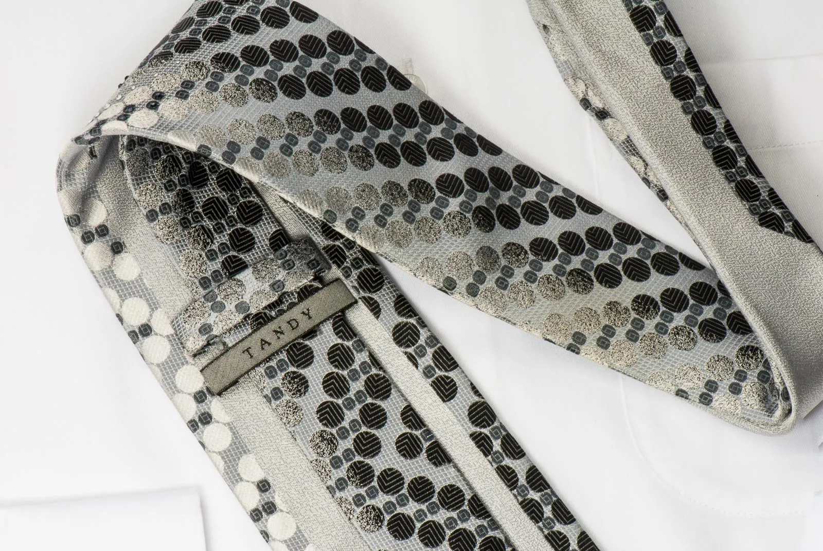 Tandy Rhinestone Tie Black Geometric Dots On Silver Silk With Micro Silver Sparkles